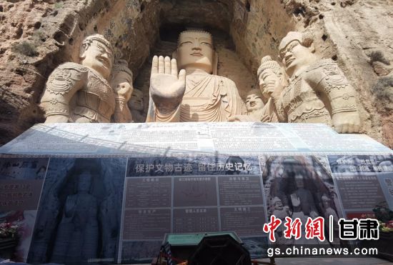 時(shí)下，中國(guó)“石窟鼻祖”天梯山石窟第13窟大佛足部與局部危巖體搶救性保護(hù)項(xiàng)目正在施工。圖為施工現(xiàn)場(chǎng)。陳曉斌 攝